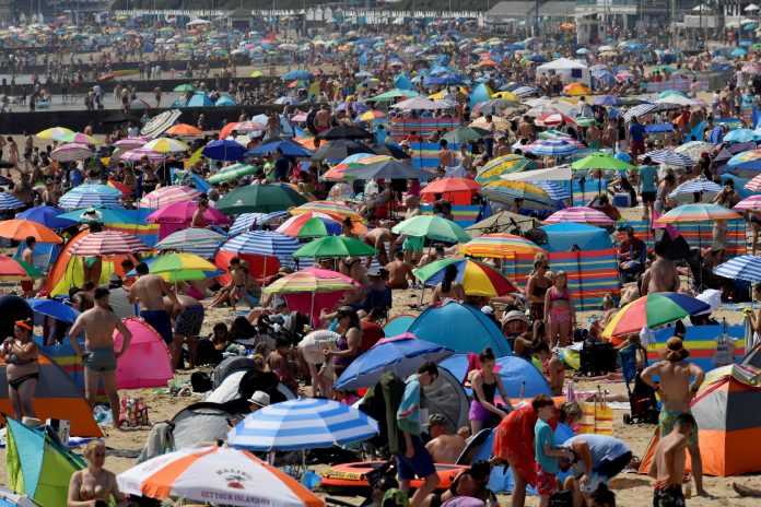 2021-07-01t080331z-1313405123-rc2kbo9ybqkq-rtrmadp-3-health-coronavirus-europe-tourism-scaled