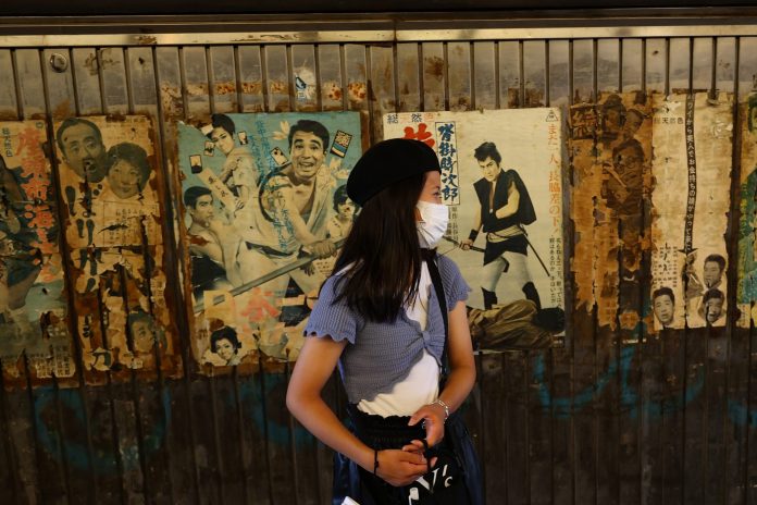 2021-08-05t120402z-613674409-sp1eh850xiohk-rtrmadp-3-health-coronavirus-japan-scaled