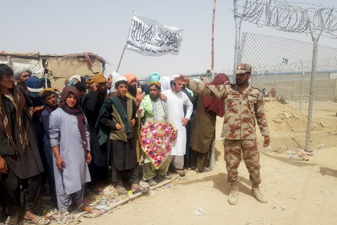 2021-08-17t132739z-1738045092-rc2y6p91kk93-rtrmadp-3-afghanistan-conflict-pakistan-1-scaled