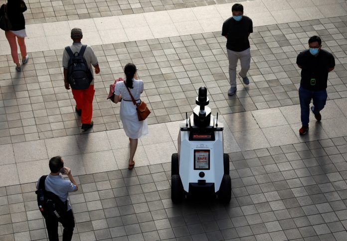 2021-09-06t120800z-1548317503-rc2akp916rk9-rtrmadp-3-singapore-robot-crime-b-scaled