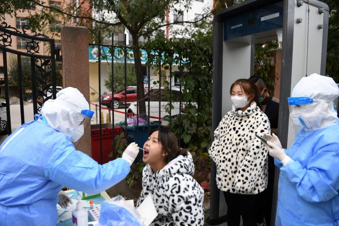 2021-10-20t090646z-1185854610-rc2hdq9ntqkj-rtrmadp-3-health-coronavirus-china-scaled