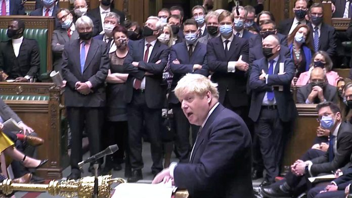 2022-01-12t120916z-1448295235-rc2oxr99zpoz-rtrmadp-3-britain-politics-pmqs-1