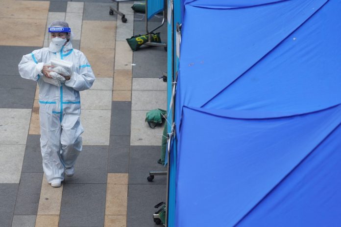2022-02-07t100826z-269677842-rc2xes9ivccj-rtrmadp-3-heatlh-coronavirus-hongkong-scaled