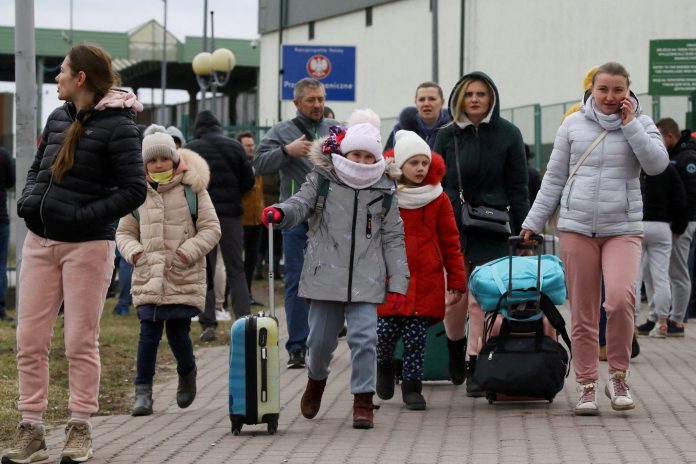 2022-02-25t204143z-626821751-rc2vqs93qffx-rtrmadp-3-ukraine-crisis-usa-immigration-scaled