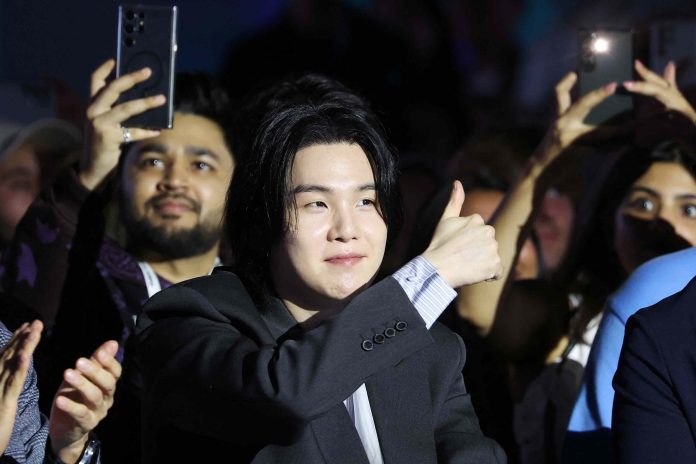 suga-da-banda-sul-coreana-bts-em-evento-seul-scaled