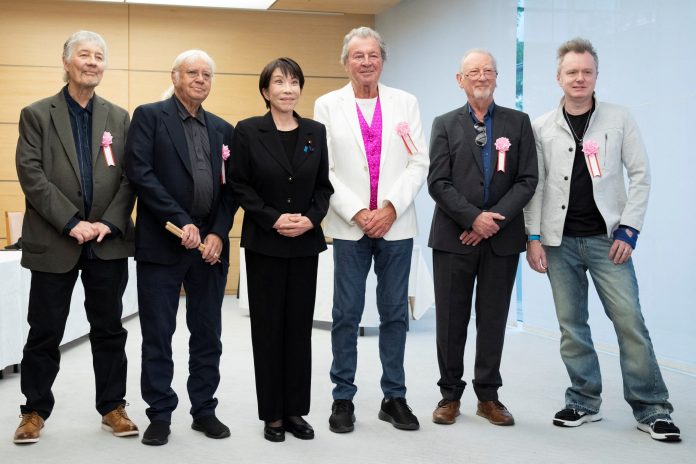 2026-04-10t065957z-992294931-rc26mkahqmhb-rtrmadp-3-japan-politics-takaichi-deep-purple-scaled